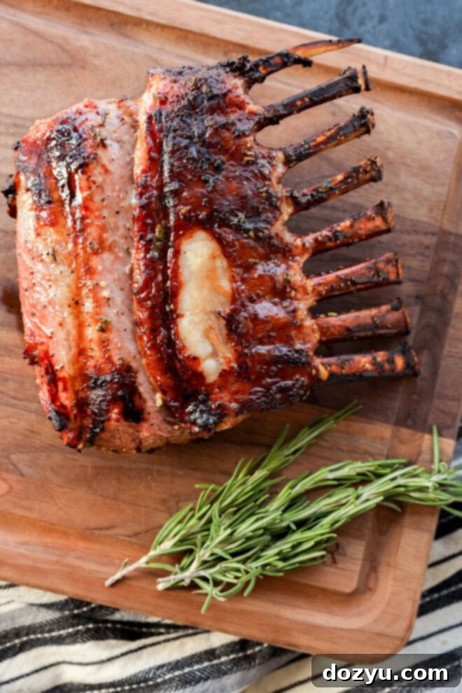 rack of meat on cutting board before slicing
