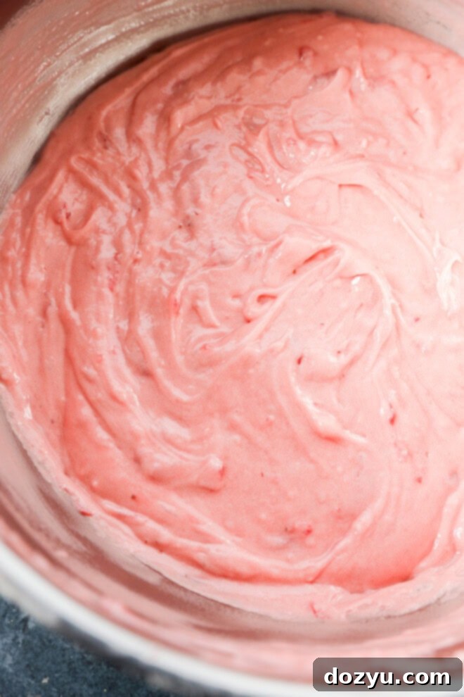 fresh strawberry cake batter in a bowl