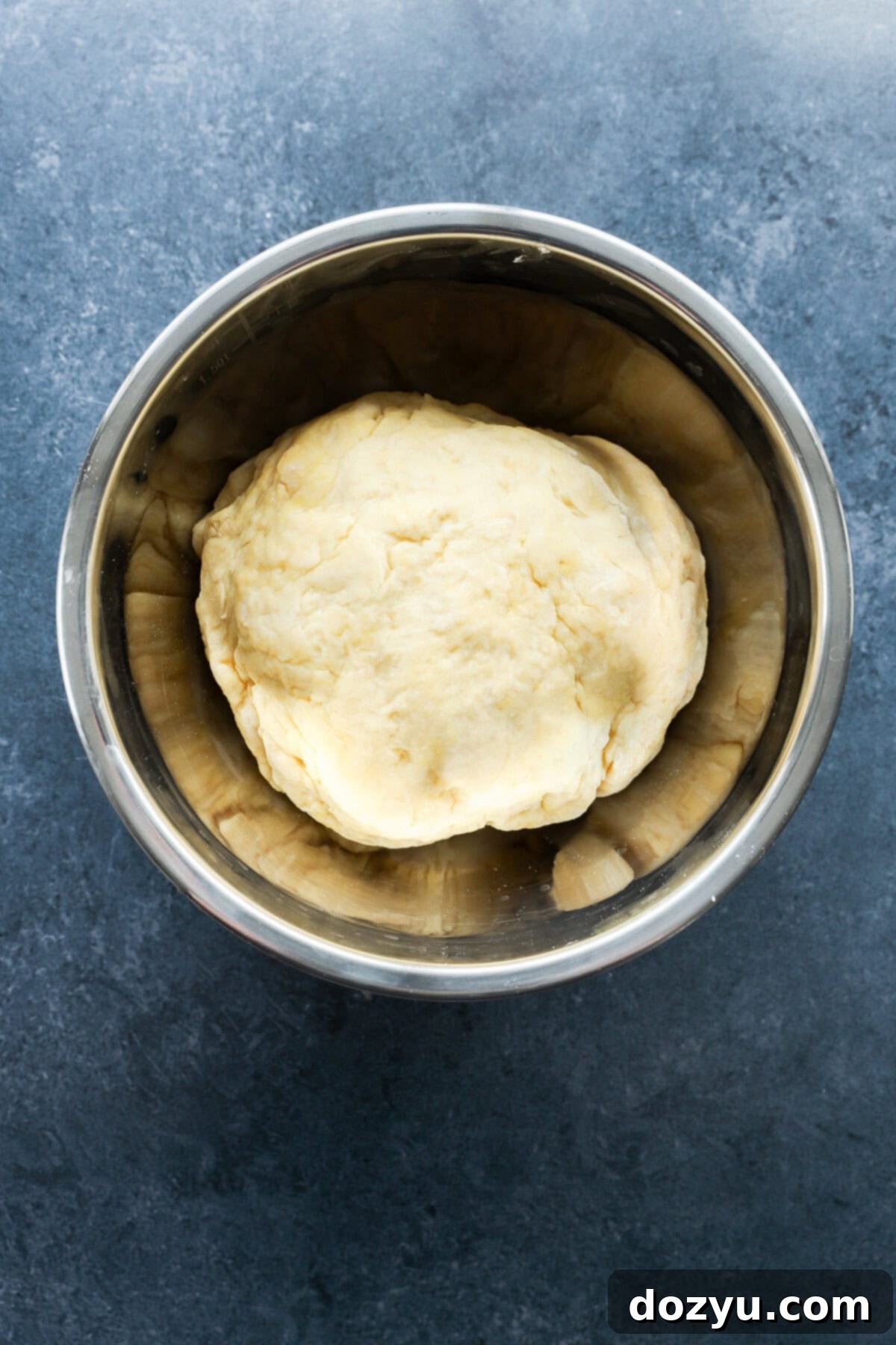 Flawless Empanada Dough Made Easy 10 homemade pastry in bowl before chilling