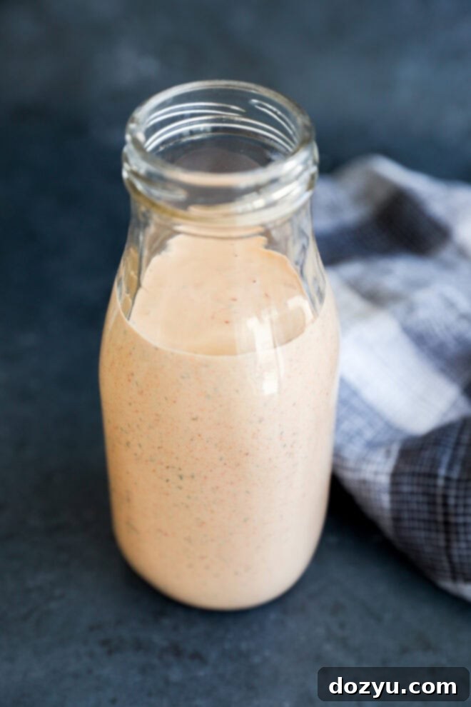 easy spicy and creamy sauce in a glass carafe