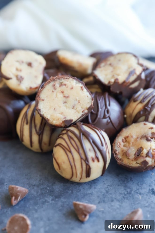 Effortless No-Bake Cookie Dough Treats 3 chocolate chip cookie dough bites cut in half image
