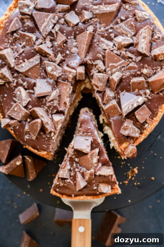 A Toblerone cheesecake with chunks of chocolate and a creamy interior.